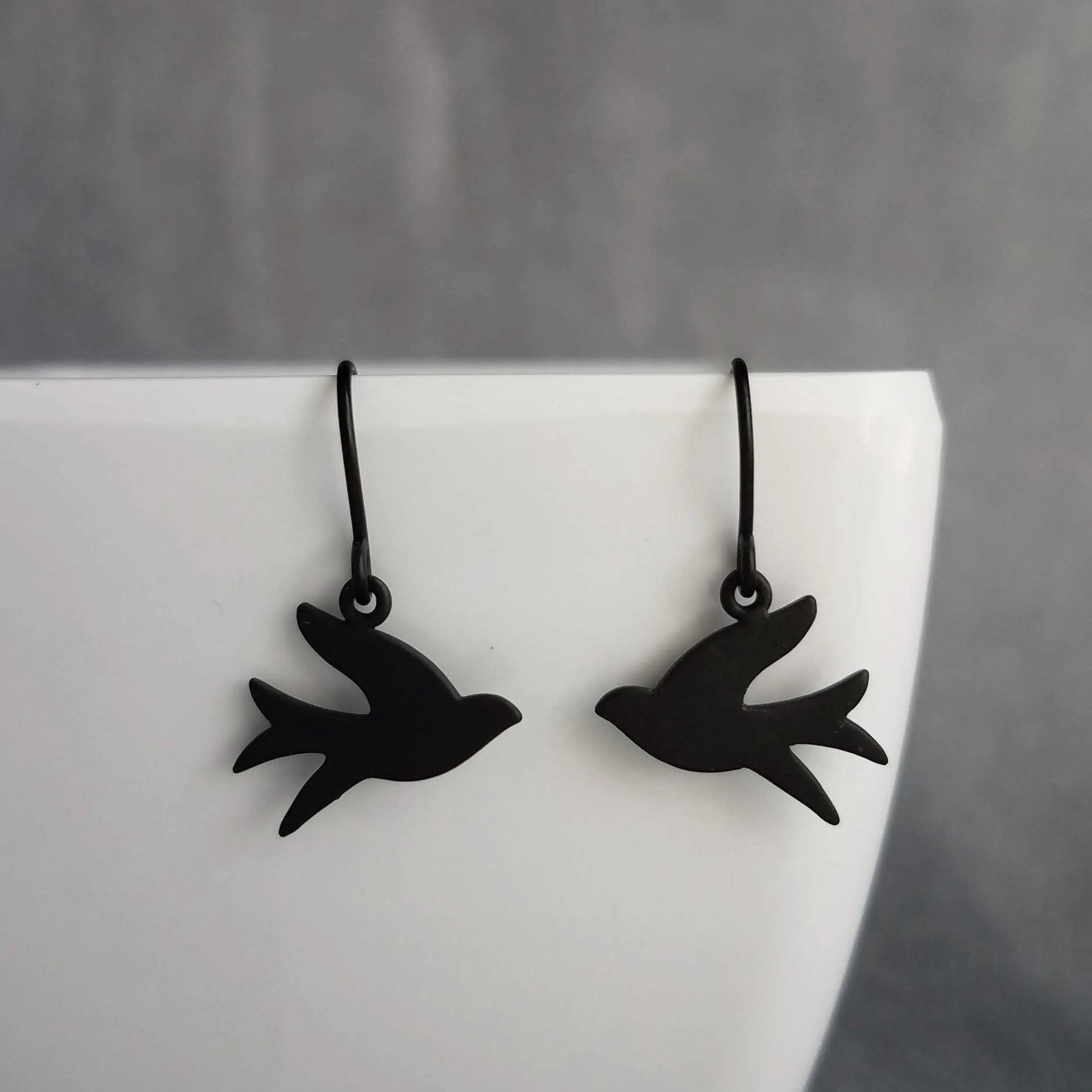 Black Bird Earrings, matte black earring, little bird earring, small bird earring, sparrow earring, flying bird earring, facing each other