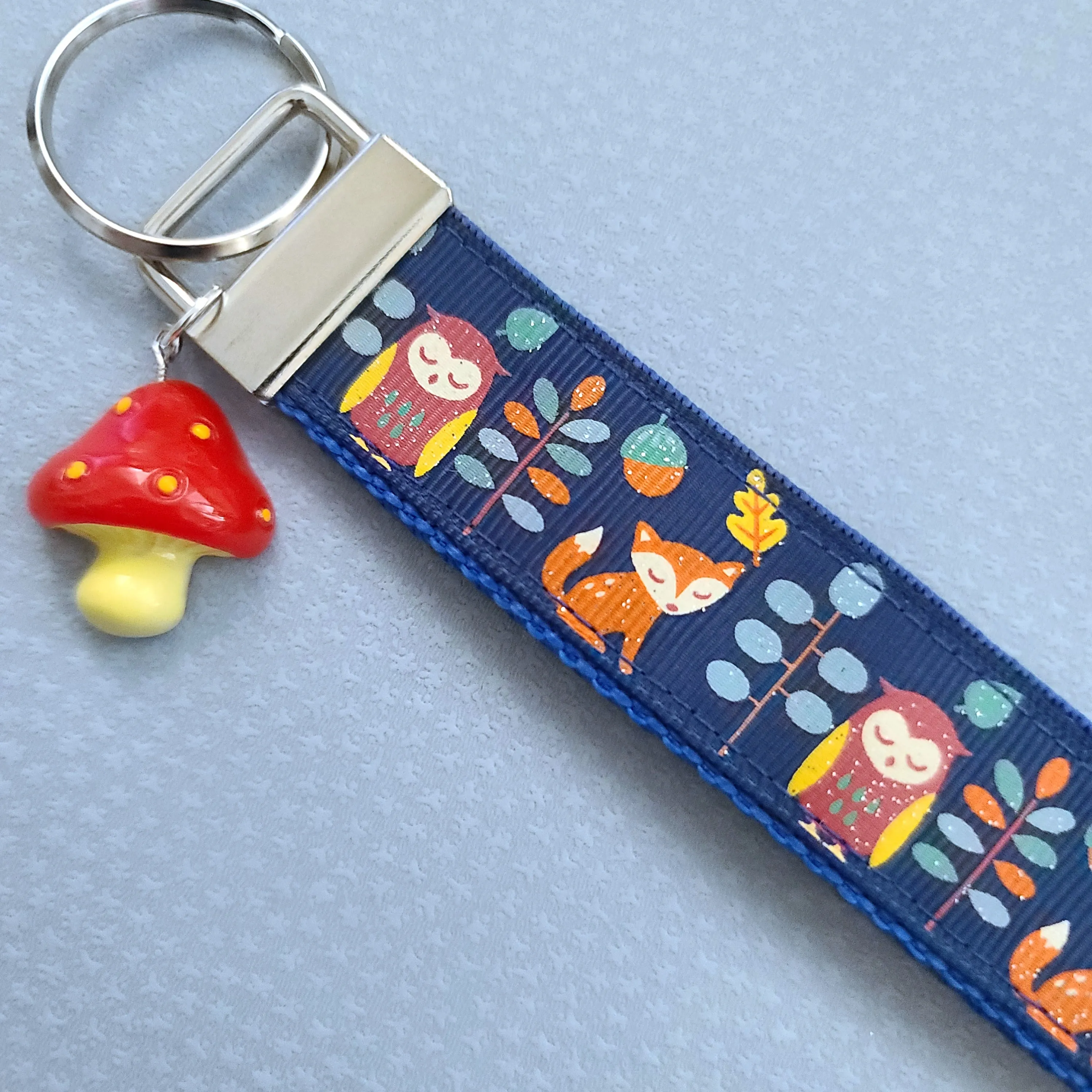 Fox and Owl Glittery Blue Key Fob Wristlet with Mushroom Charm